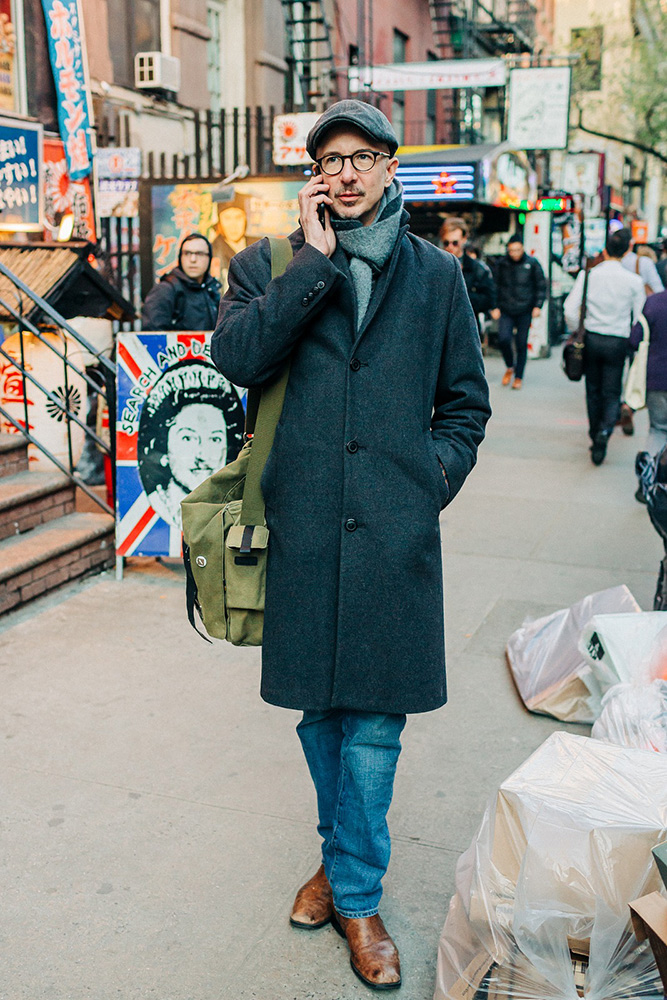 Tyler C. Gore walking on St. Marks Place, East Village, NYC.  Photo by James Prochnik.